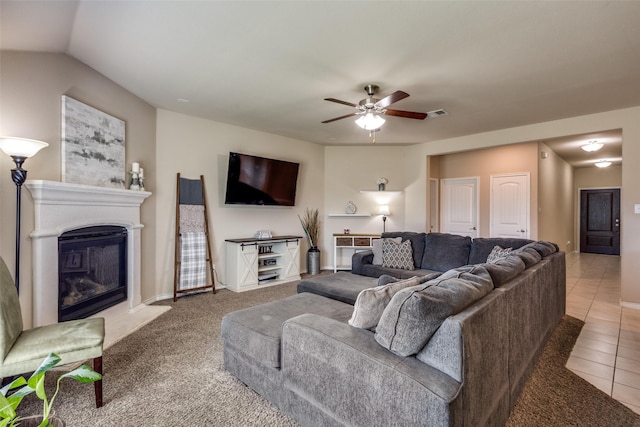 2613 Hillrich Dr, Anna, TX 75409 - tiled living area featuring ceiling fan, a glass covered fireplace, and baseboards