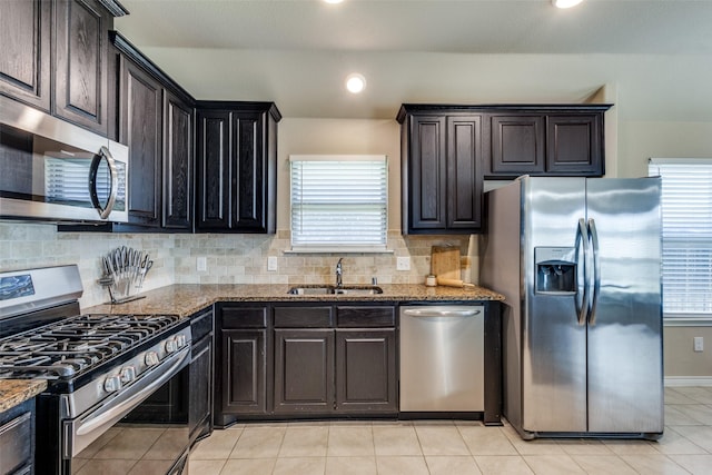 2613 Hillrich Dr, Anna, TX 75409 - kitchen with stainless steel appliances, plenty of natural light, stone countertops, and recessed lighting