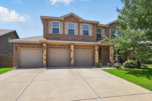 5321 Threshing Dr, Fort Worth, TX 76179 - view of front of property with brick siding, concrete driveway, an attached garage, and a garage