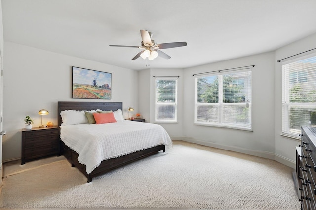 5321 Threshing Dr, Fort Worth, TX 76179 - bedroom with light carpet, ceiling fan, and baseboards