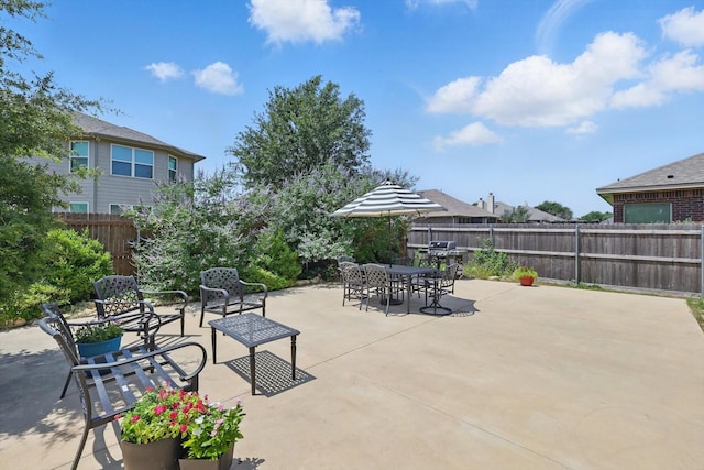 5321 Threshing Dr, Fort Worth, TX 76179 - fenced backyard with a patio area and outdoor dining space
