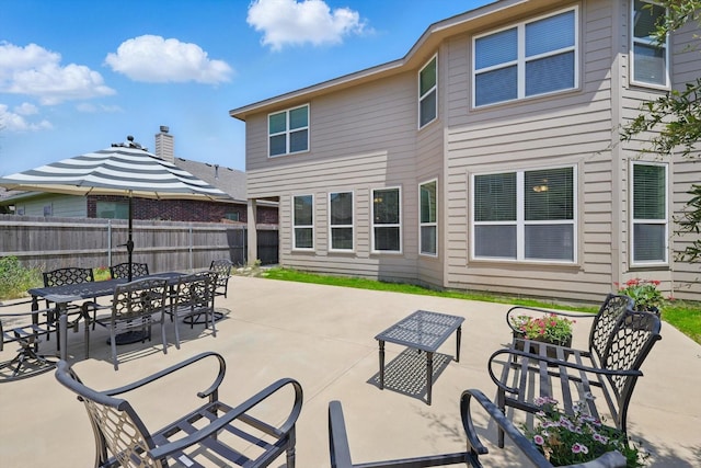 5321 Threshing Dr, Fort Worth, TX 76179 - fenced backyard featuring outdoor dining area and a patio