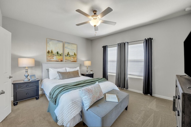 2105 Rolling Wild Rd, Forney, TX 75126 - bedroom with light colored carpet, baseboards, and a ceiling fan