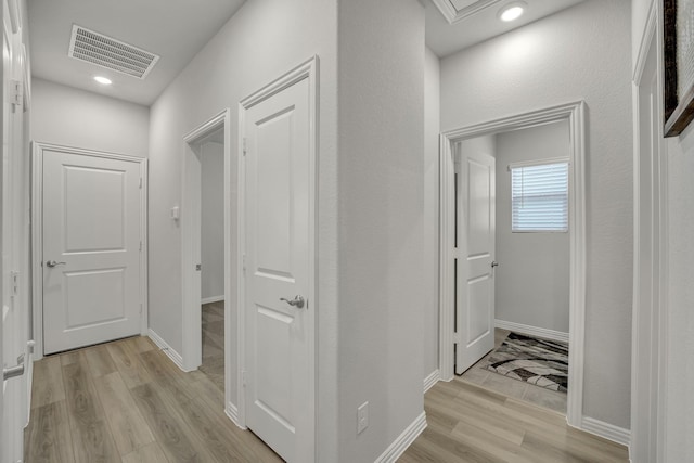 2105 Rolling Wild Rd, Forney, TX 75126 - hallway featuring light wood finished floors and baseboards
