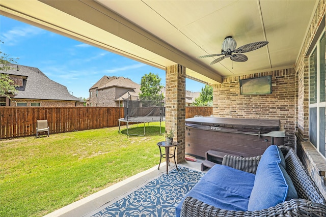 955 Champions Way, Roanoke, TX 76262 - view of patio featuring a hot tub, a trampoline, and ceiling fan