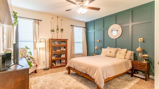 1715 Swale Ln, Granbury, TX 76049 - bedroom with light colored carpet, multiple windows, baseboards, and a ceiling fan