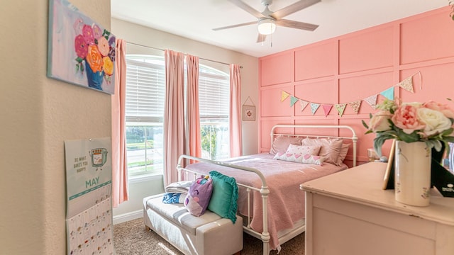 1715 Swale Ln, Granbury, TX 76049 - carpeted bedroom featuring multiple windows, ceiling fan, and baseboards