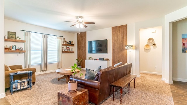 1715 Swale Ln, Granbury, TX 76049 - living area featuring ceiling fan, wood finished floors, and baseboards