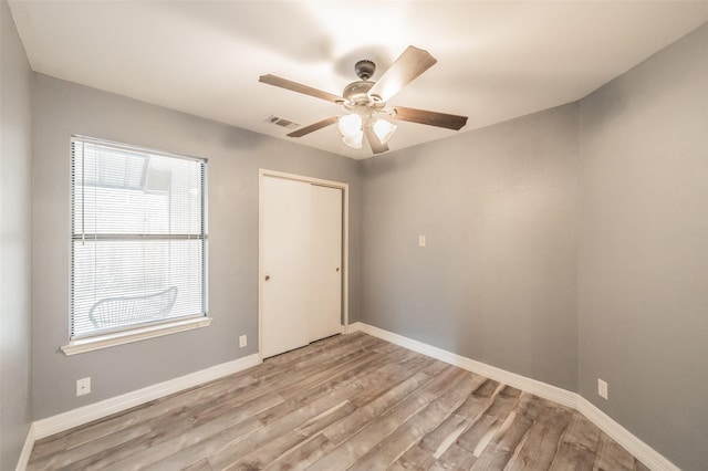 5622 Polo Club Dr, Arlington, TX 76017 - empty room with light wood-style flooring, baseboards, and a ceiling fan
