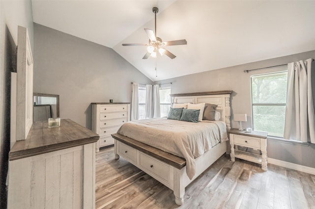 5622 Polo Club Dr, Arlington, TX 76017 - bedroom featuring lofted ceiling, light wood-style flooring, multiple windows, a ceiling fan, and baseboards