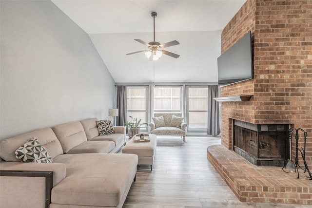 5622 Polo Club Dr, Arlington, TX 76017 - living room featuring wood finished floors, a ceiling fan, a brick fireplace, and high vaulted ceiling