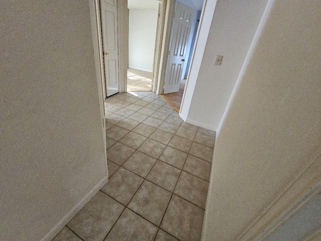 404 L Thompson St, Cedar Hill, TX 75104 - corridor with light tile patterned floors and baseboards