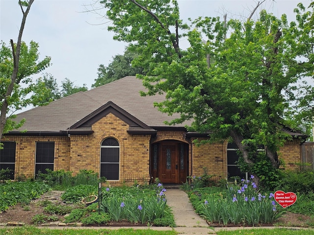 404 L Thompson St, Cedar Hill, TX 75104 - view of front of property featuring brick siding and a shingled roof