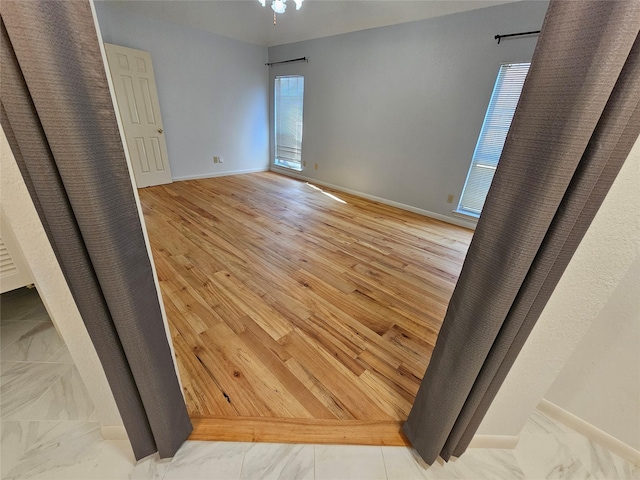 404 L Thompson St, Cedar Hill, TX 75104 - unfurnished bedroom with baseboards and marble look tile flooring