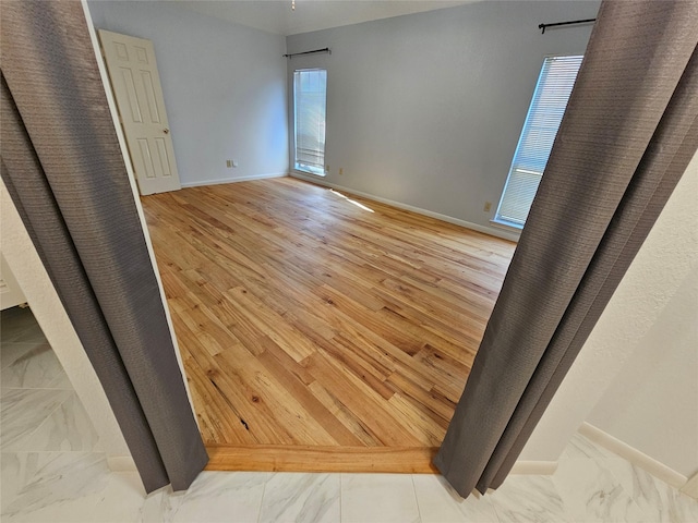 404 L Thompson St, Cedar Hill, TX 75104 - unfurnished bedroom featuring marble finish flooring and baseboards