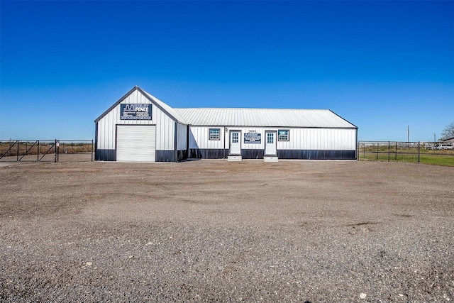 3614 County Road 902, Joshua, TX 76058 - view of front of property featuring an outdoor structure, a garage, and an outbuilding