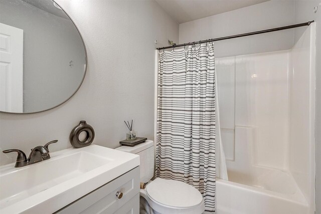 3614 County Road 902, Joshua, TX 76058 - full bathroom with toilet, vanity, and shower / tub combo