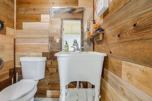 3614 County Road 902, Joshua, TX 76058 - half bathroom with wooden walls and toilet