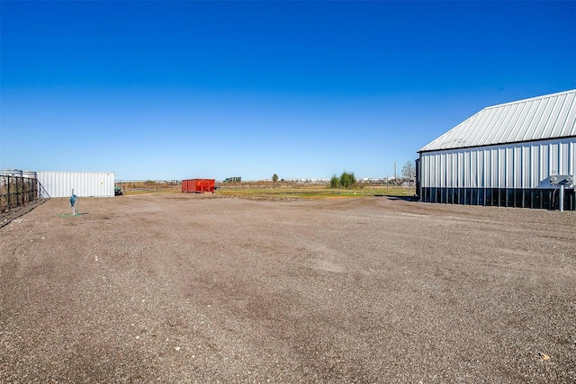 3614 County Road 902, Joshua, TX 76058 - view of yard featuring an outdoor structure, an outbuilding, and a garage
