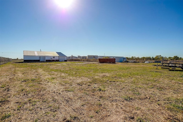 3614 County Road 902, Joshua, TX 76058 - view of grassy yard with an outbuilding and a pole building