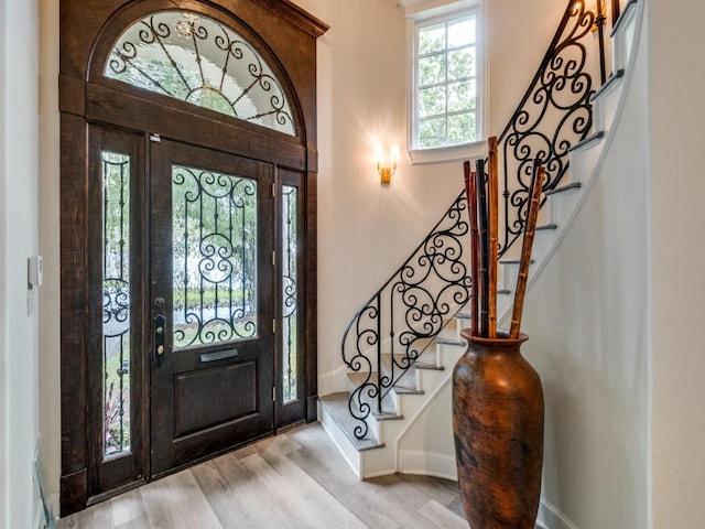 4414 Westway Ave, Highland Park, TX 75205 - foyer with wood finished floors, stairs, and baseboards