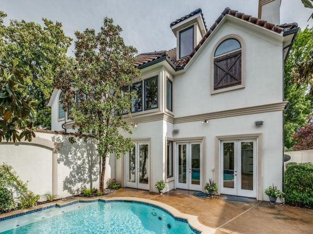 4414 Westway Ave, Highland Park, TX 75205 - back of house with french doors, a tiled roof, and stucco siding