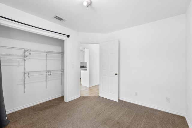 7578 Dick Price Rd, Mansfield, TX 76063 - unfurnished bedroom with light carpet, a closet, and baseboards