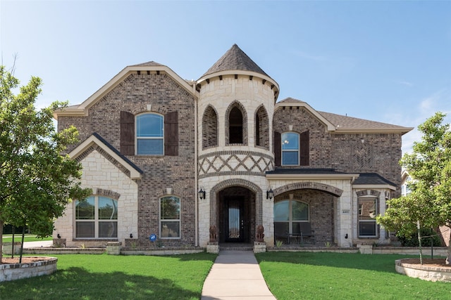 4401 Bingley Way, Mansfield, TX 76063 - french country style house with a front lawn, brick siding, and stone siding