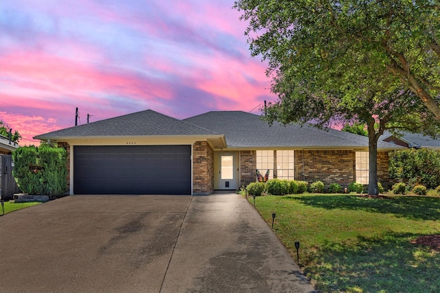 5240 Hill Ridge Dr, Fort Worth, TX 76135 - ranch-style house featuring driveway, an attached garage, a front lawn, brick siding, and roof with shingles