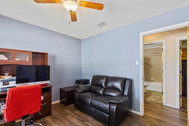 5240 Hill Ridge Dr, Fort Worth, TX 76135 - home office with wood finished floors, a ceiling fan, a textured ceiling, and baseboards