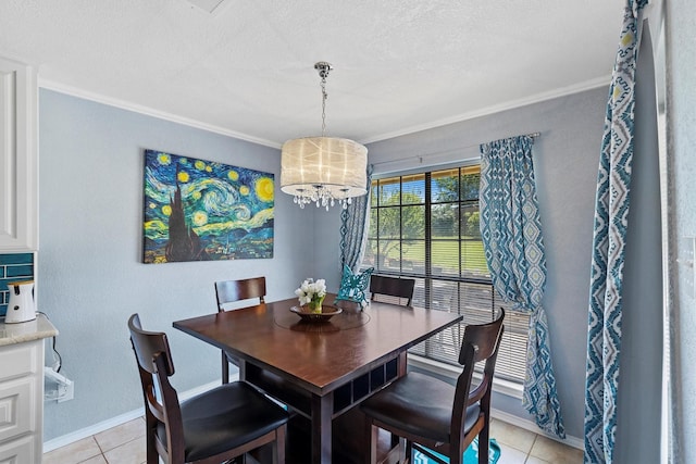 5240 Hill Ridge Dr, Fort Worth, TX 76135 - dining space with crown molding, a chandelier, baseboards, light tile patterned floors, and a textured ceiling