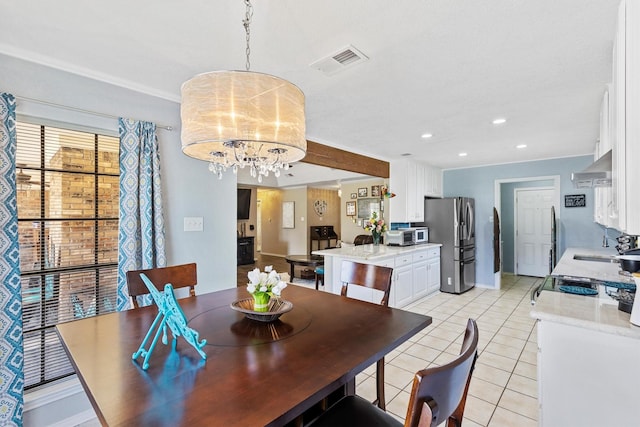 5240 Hill Ridge Dr, Fort Worth, TX 76135 - dining area featuring light tile patterned flooring, recessed lighting, crown molding, a chandelier, and baseboards