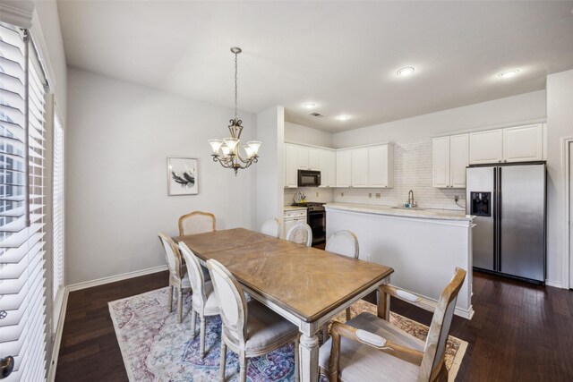6116 Portrush Dr, Fort Worth, TX 76116 - dining space featuring a chandelier, dark wood-type flooring, recessed lighting, and baseboards