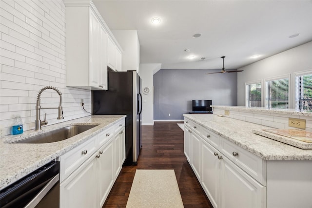 6116 Portrush Dr, Fort Worth, TX 76116 - kitchen with a sink, dishwasher, stainless steel refrigerator with ice dispenser, tasteful backsplash, and white cabinets