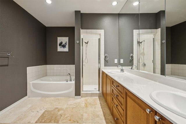 6116 Portrush Dr, Fort Worth, TX 76116 - full bathroom with a garden tub, a shower stall, double vanity, baseboards, and recessed lighting