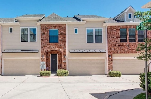 6116 Portrush Dr, Fort Worth, TX 76116 - townhome / multi-family property featuring a garage, driveway, and brick siding