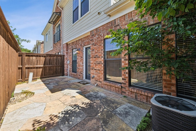 6116 Portrush Dr, Fort Worth, TX 76116 - fenced backyard featuring a patio and cooling unit