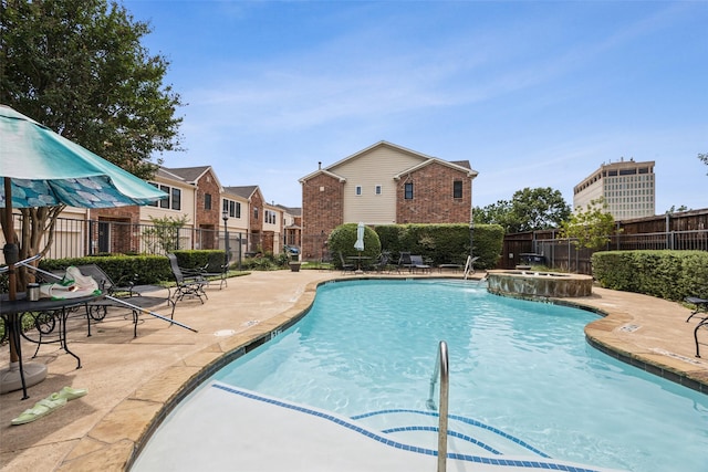 6116 Portrush Dr, Fort Worth, TX 76116 - community pool featuring a fenced backyard, a patio area, and a community hot tub