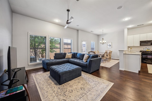 6116 Portrush Dr, Fort Worth, TX 76116 - living area featuring a chandelier, dark wood-style flooring, recessed lighting, and baseboards