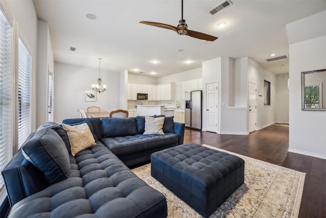 6116 Portrush Dr, Fort Worth, TX 76116 - living area featuring plenty of natural light, a chandelier, a ceiling fan, dark wood finished floors, and recessed lighting
