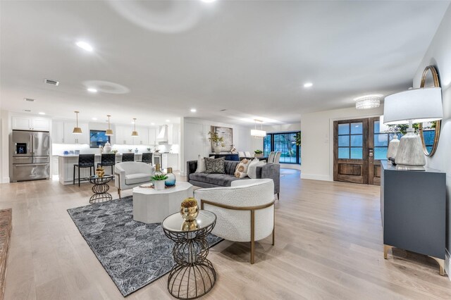 6702 Rolling Vista Dr, Dallas, TX 75248 - living area with light wood-type flooring, recessed lighting, and baseboards