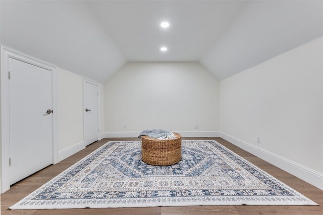 6702 Rolling Vista Dr, Dallas, TX 75248 - sitting room with wood finished floors, baseboards, vaulted ceiling, and recessed lighting