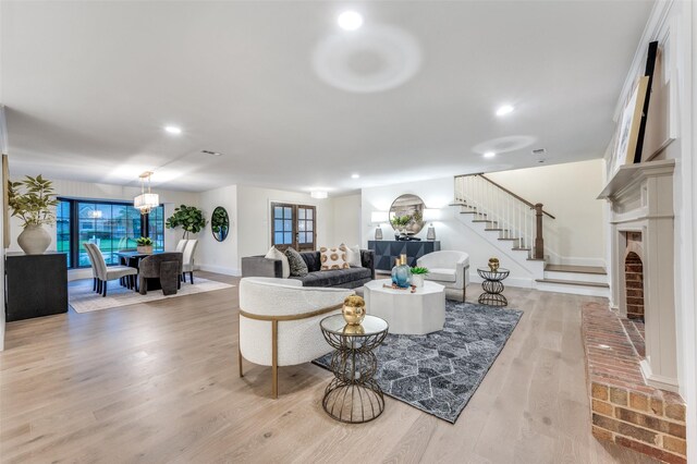 6702 Rolling Vista Dr, Dallas, TX 75248 - living area with stairway, baseboards, light wood-style floors, recessed lighting, and a fireplace
