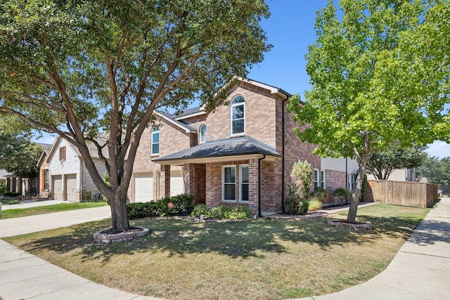 208 Bluefinch, Little Elm, TX 75068 - traditional-style home with brick siding, concrete driveway, and a garage
