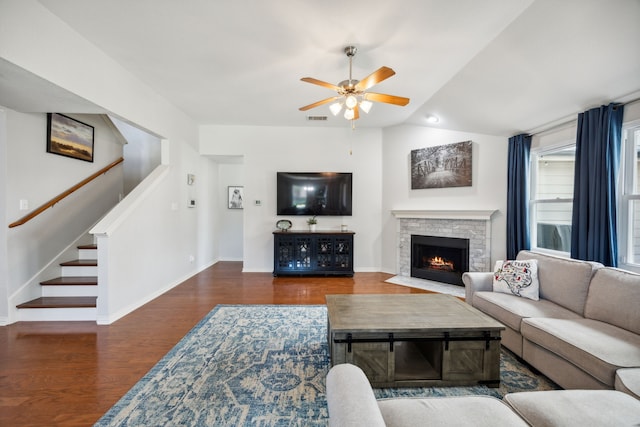208 Bluefinch, Little Elm, TX 75068 - living area with ceiling fan, wood finished floors, baseboards, vaulted ceiling, and stairway