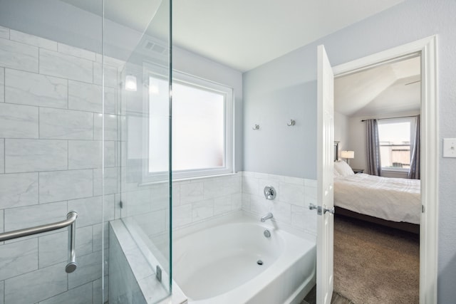208 Bluefinch, Little Elm, TX 75068 - bathroom with ensuite bathroom, plenty of natural light, a bath, and a tile shower
