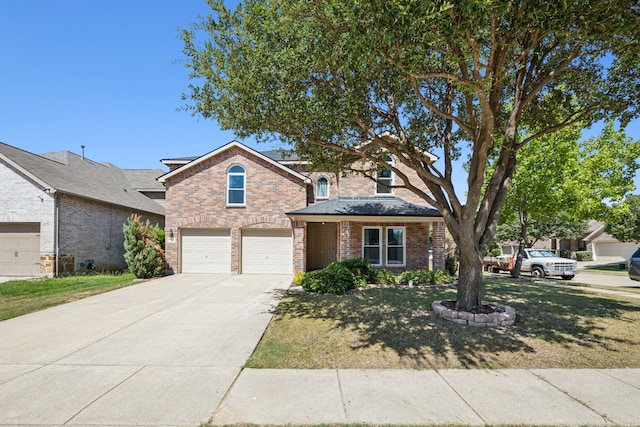 208 Bluefinch, Little Elm, TX 75068 - traditional home with brick siding, an attached garage, a front yard, and driveway