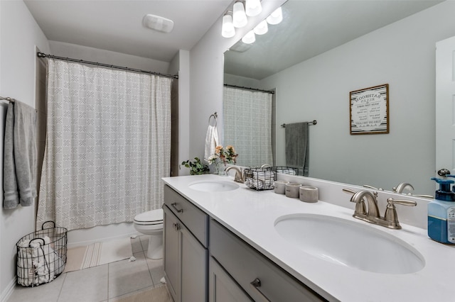 10009 Callan Ln, Fort Worth, TX 76131 - bathroom featuring tile patterned floors, double vanity, toilet, and shower / tub combo with curtain