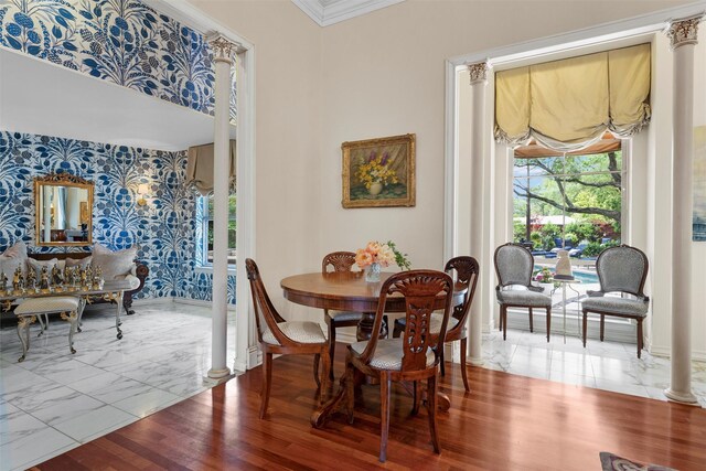 3012 Wood Lake Dr, Waco, TX 76710 - dining area featuring ornamental molding, baseboards, decorative columns, wallpapered walls, and marble finish floors
