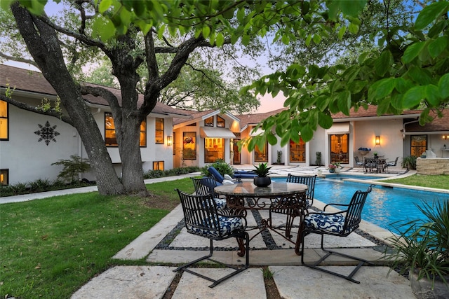 3012 Wood Lake Dr, Waco, TX 76710 - swimming pool with a patio, outdoor dining area, and a lawn